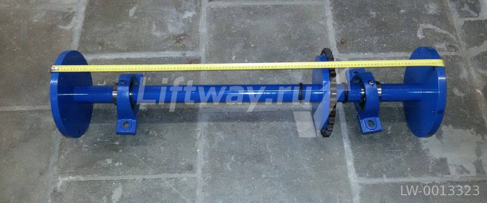 Вал (цепного) привода поручней в сборе траволатора 606 NCT 1000mm (одинарная звездочка)
